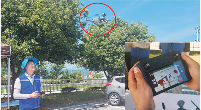 지난 4일 전남 화순군 도곡면 행정복지센터에서 화순군 드론순찰단이 폭염 예찰활동을 위해 드론(빨간 원)을 띄우고 있다. 작은 사진은 드론 적외선 감지 기능을 활용해 모니터링하는 모습.
김대우 기자 