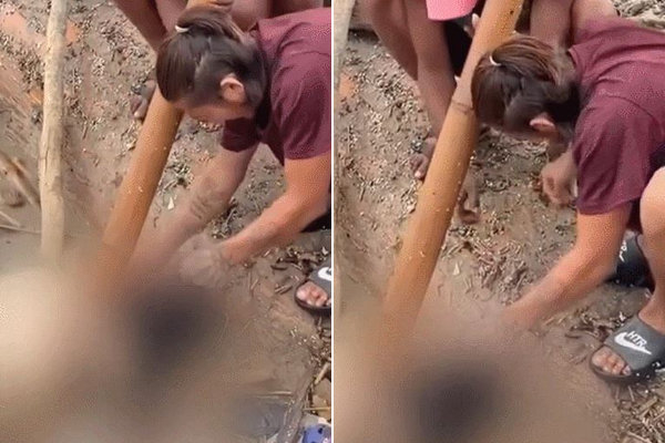 네팔에서 발생한 대홍수로 사망한 희생자의 시신에서 금 귀걸이를 훔치는 두 남성의 모습. X캡처