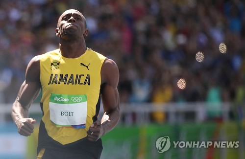 (리우데자네이루=연합뉴스)  ‘인간탄환’ 우사인 볼트(자메이카)가 13일 오후(현지시간) 브라질 리우데자네이루 올림픽 주경기장에서 열린 2016 리우올림픽 남자 육상 100m 예선에서 질주하고 있다.
