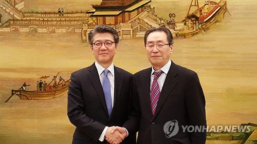 지난 3월 18일 오후 베이징(北京)에서 양자 회동을 했을 당시의 한중 6자회담 수석 대표들. 왼쪽이 김홍균 외교부 한반도평화교섭본부장이고 오른쪽이 우다웨이(武大偉) 중국 외교부 한반도사무특별대표다.