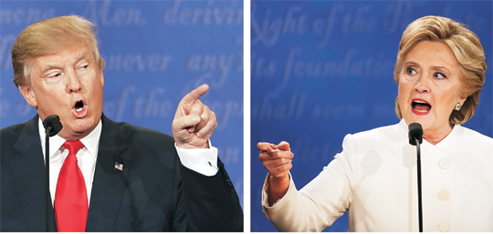 11월 8일 미국 대선을 앞두고 19일 네바다주 라스베이거스 네바다대에서 열린 대선후보 마지막 TV토론에서 공화당 대선후보 도널드 트럼프(왼쪽)와 민주당 대선후보 힐러리 클린턴 전 국무장관이 낙태, 이민 문제 등에 대한 진행자의 질문에 답하며 상대의 입장을 비판하고 있다.