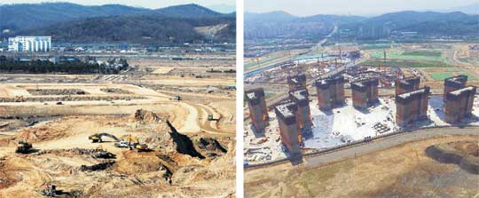 11·3 부동산대책 영향으로 서울 강남권과 경기 과천권 집값이 내림세를 보이고 있는 가운데 규제가 덜한 공공택지 분양아파트에 관심이 쏠리고 있다. 사진은 남양주 다산신도시 택지와 아파트 건설 모습.