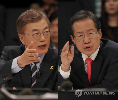 더불어민주당 문재인 대선후보(왼쪽)와 자유한국당 홍준표 대선후보[연합뉴스 자료사진]