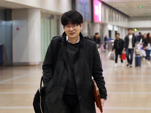 사전점검 마치고 베이징 도착한 탁현민.[베이징=연합뉴스]
