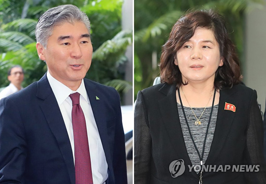 (싱가포르=연합뉴스) 북미정상회담을 하루 앞둔 11일 오전 성 김 주 필리핀 미국 대사(왼쪽)와 최선희 북한 외무성 부상이 각각 실무회담장인 싱가포르 리츠칼튼 밀레니아호텔로 들어서고 있다.