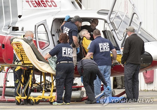 추락한 알래스카 경비행기 탑승자 구조