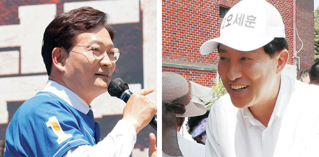 사진 왼쪽부터 송영길 더불어민주당 서울시장 후보가 24일 서울 청계광장에서 유엔 아시아본부 유치 정책을 알리는 공약홍보에 나서고 있다. 오세훈 국민의힘 서울시장 후보가 24일 서울 구로구 고척중앙시장을 방문해 한 상인과 주먹인사를 나누고 있다. 연합뉴스