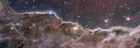NASA가 12일(현지시간) 공개한 용골자리 성운의 우주 절별과 아기별의 다른 사진. NASA AFP 연합뉴스