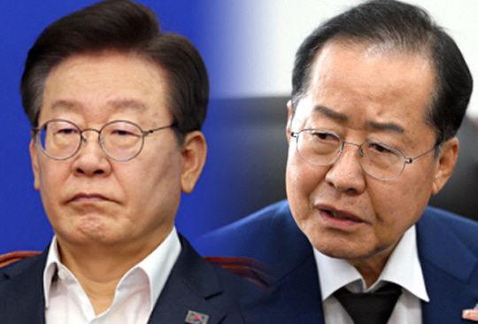 이재명 더불어민주당 대표와 홍준표 대구 시장. 뉴시스