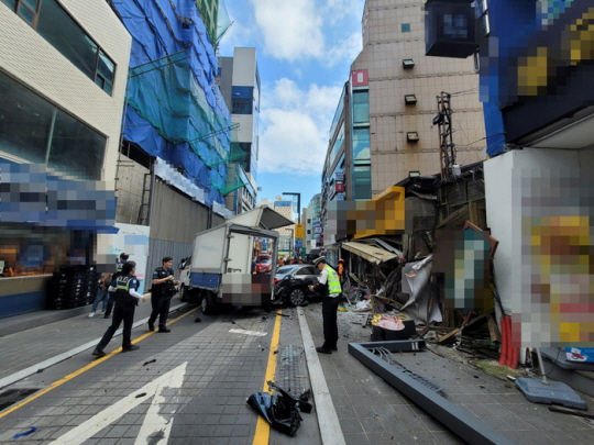 지난 9월12일 오후 1시13분쯤 부산 해운대구청 인근에서 승용차가 인도로 돌진해 2명이 숨졌다. 부산경찰청 제공